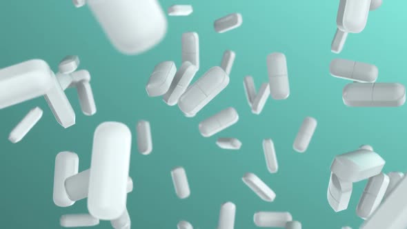 Pills and Medicine Tablets Slowly Falling on the Laboratory Background Loop