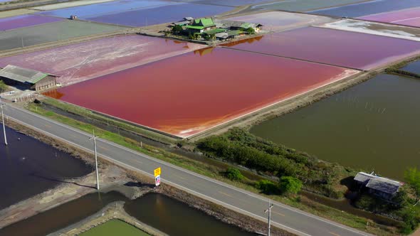 Phetchaburi Salt Flats Naklua Farms and Farmers Collecting Salt in Phetchaburi Thailand