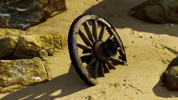 Old Wooden Cart Wheel at Sand Beach