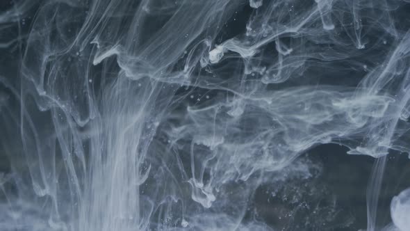 White acrylic paint in water alt