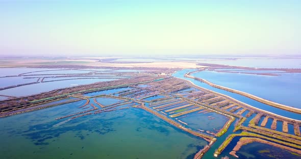 Motion Over Landscape with Bright Blue Venetian Channels