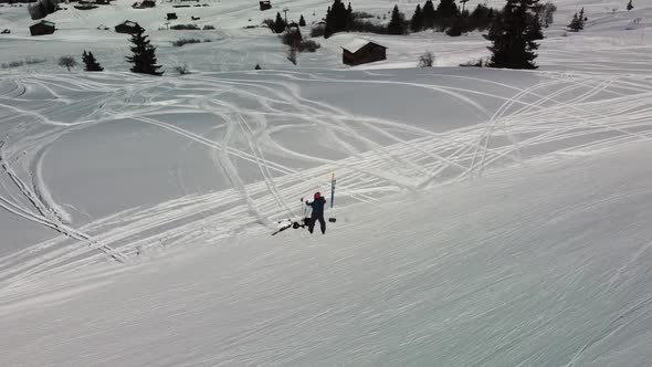 Skiing in Winter Holiday in Switzerland  at SwissAlps from Drone View