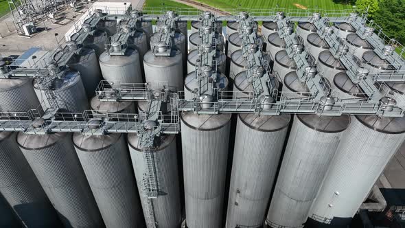 Silos and stainless steel tanks for beer fermentation. Industrial factory manufacturing in America t