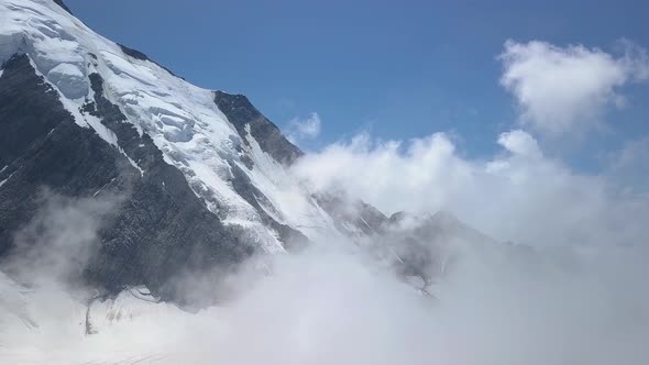 Flying Over Bionnassay Glacier in the Alpine Mountains