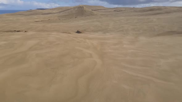 Aerial footage of Giant sand dunes in New Zealand