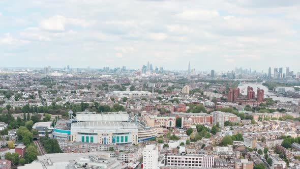 slider drone shot around stamford bridge chelsea stadium London skyline