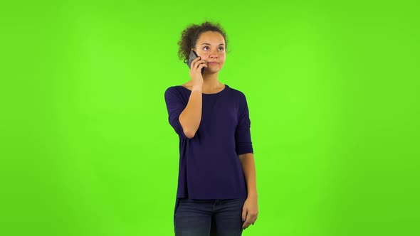 Curly Woman Talking for Mobile Phone. Green Screen