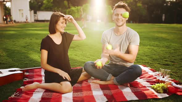 Young Beautiful Couple Smiling Resting in Park