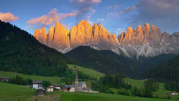 St Magdalena (Santa Maddalena), Italy. Sunset Landscape with Dolomites Mountains in the Background