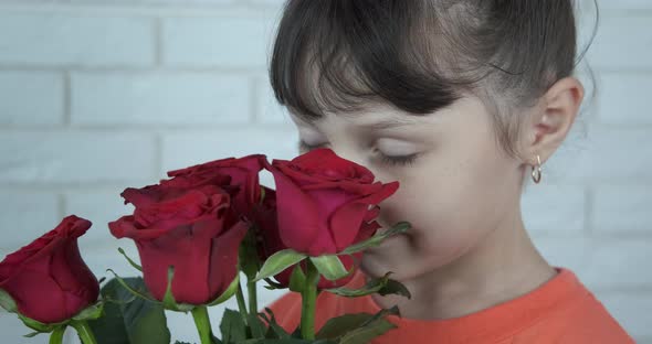 Little Girl with Roses