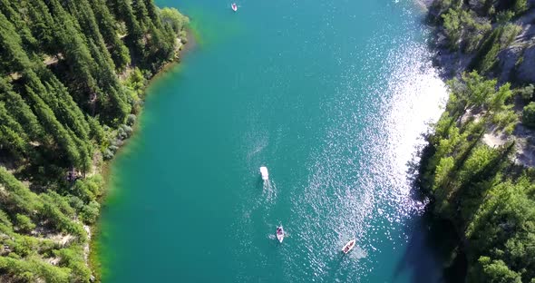 Kolsay Lake Among Green Hills and Mountains.