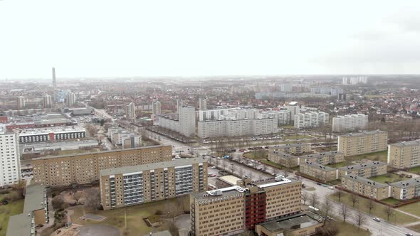 Aerial Dolly zoom of buildings and road in city Malmo in Sweden