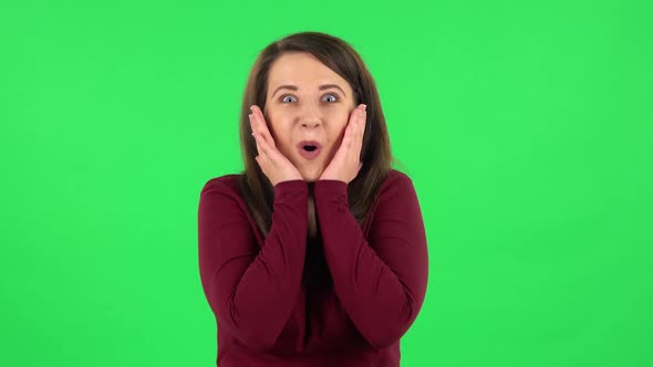 Portrait of Pretty Girl with Wow Facial Expression, Green Screen