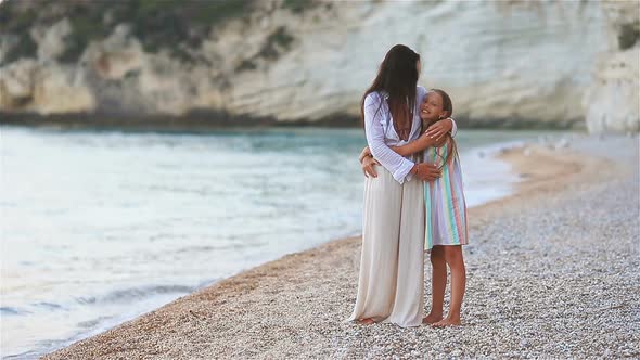 Beautiful Mother and Daughter on Caribbean Beach