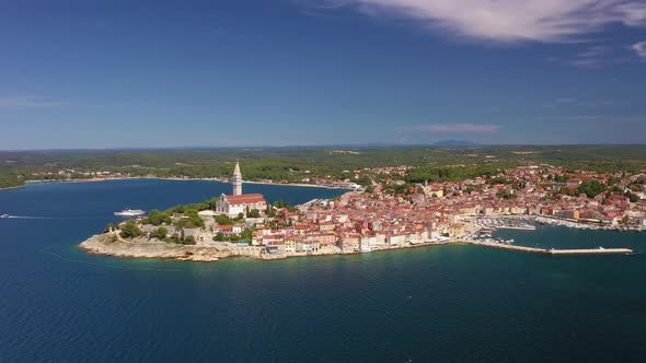 Flyby movie of the historical Croatian city Rovinj during daytime with clear skies