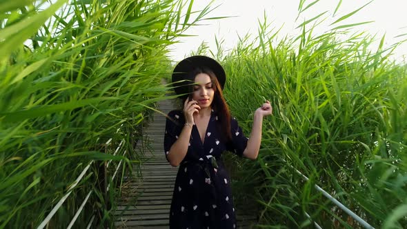 Woman Talking On Mobile Phone