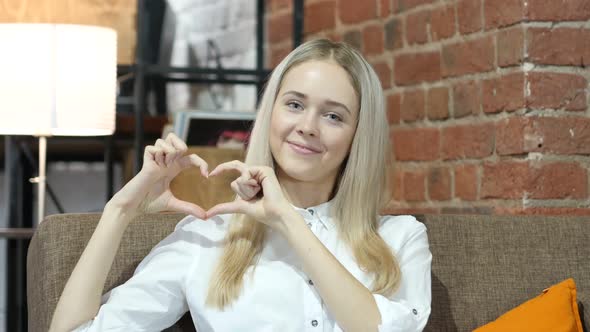 Handmade Heart Sign by  Woman, Indoor