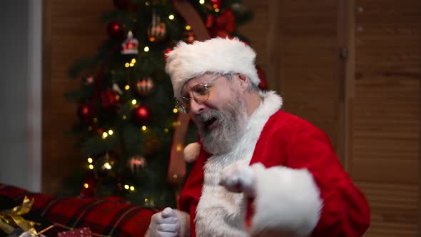 Portrait of Santa Claus Dancing Funny