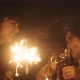 Friends enjoying the celebration of new years eve on the terrace - VideoHive Item for Sale