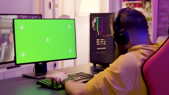 Caucasian Young Man Playing Online Games in His Room