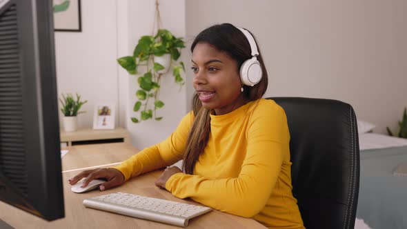 Young Hispanic Latina Woman Studying Online From Bedroom