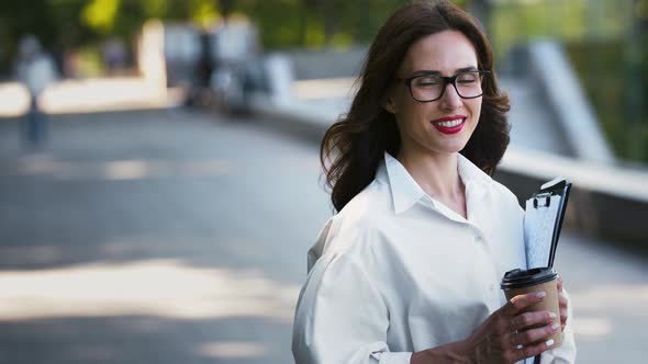 Business Female in Glasses White Shirt