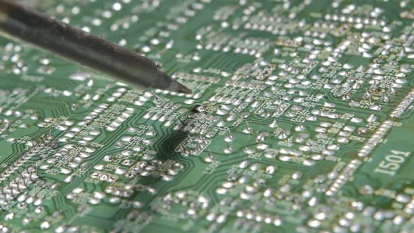 Soldering An Electronic By Soldering Iron