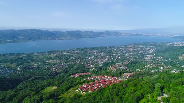 Gorgeous lake and city in green nature.