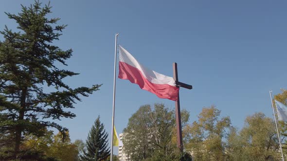 Polish Flag on the Background of the Cross.