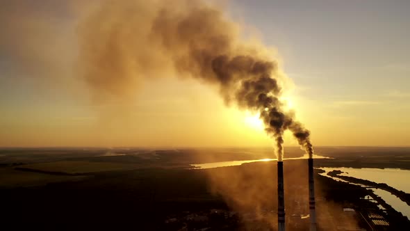 Smoke from industrial pipes. The top of the factory pipe soars