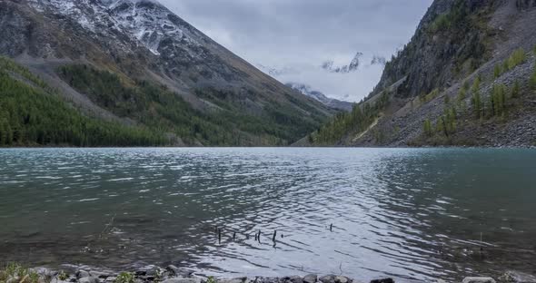 Mountain Lake Timelapse at the Summer or Autumn Time. Wild Nature and Rural Mount Valley. Green