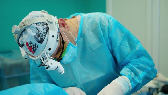 Portrait of surgeon at work. Portrait of male surgeon during operation in hospital