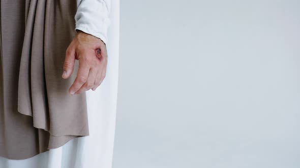 Jesus' Hands with Stigmata on a White Background alt