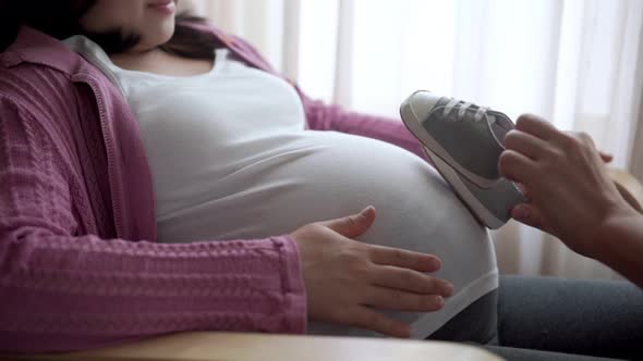 Pregnant Couple Feels Love and Relax at Home