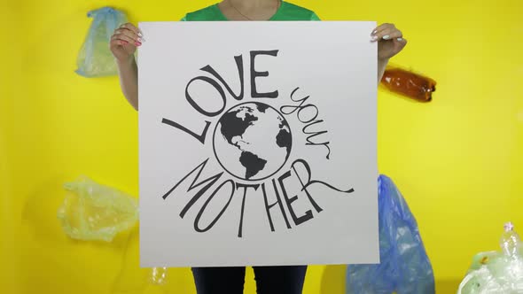 Unrecognizable Woman Holding Protesting Poster Love Your Mother Earth. Environment Plastic Pollution