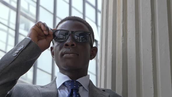 Confident and successful young black african businessman - outdoor