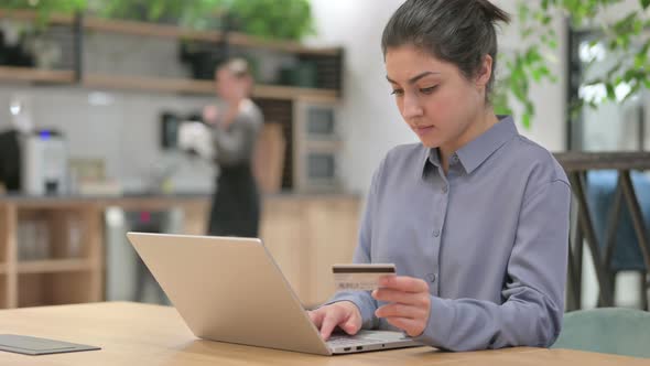 Successful Online Shopping Payment on Laptop By Indian Woman