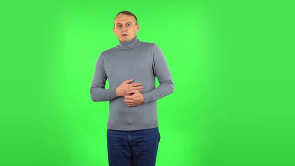 Male Looking in Surprise at Camera and Is Shocked By What He Saw. Green Screen