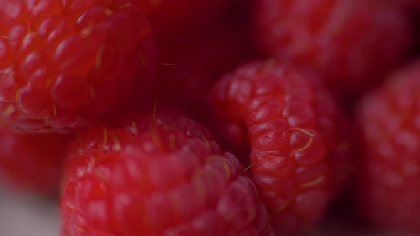 Raspberries Super Close Up Stock Footage. Raspberries in Macro Close Up with a Sliding Camera Move