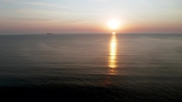 Aerial video over morning calm sea