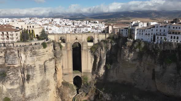 Aerial hyperlapse: Visitors explore Puente Nuevo bridge in Ronda Spain