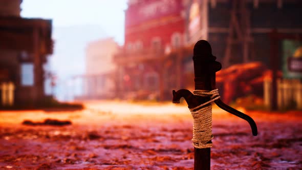 Old Rusted Water Pump in Wild West Town alt