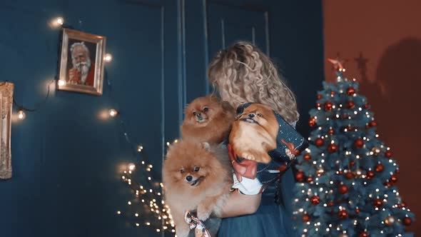 Girl in a Headscarf and with a Dog