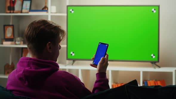 Man Watching Television in Living Room