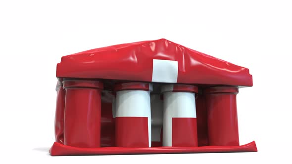 Deflating Inflatable Bank Building with Flag of Switzerland