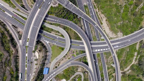 Massive multi level highway interchange with traffic on all routes, Aerial view.