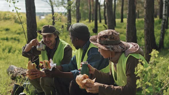 Gardeners Snacking in Forest