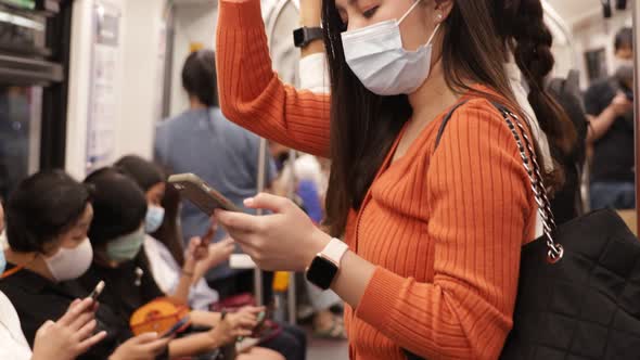 Young asian woman cover mouth , wear medical face mask to protect viruses