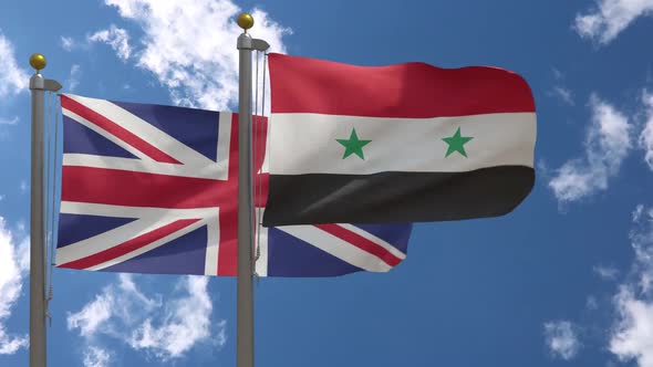 United Kingdom Flag Vs Syria Flag On Flagpole