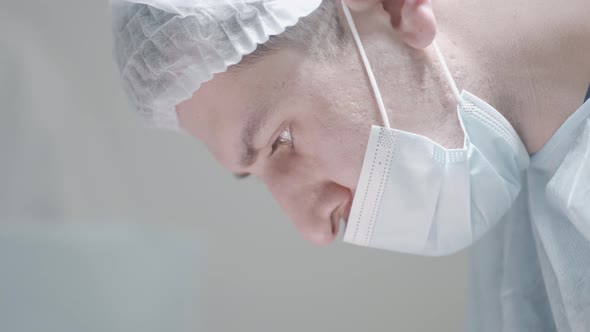 Close-up of masked surgeon during surgery